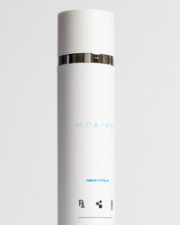 Skincare Essentials Bundle featuring tall white Neck Tyte-R bottle with silver band highlighting advanced formula gallery 1